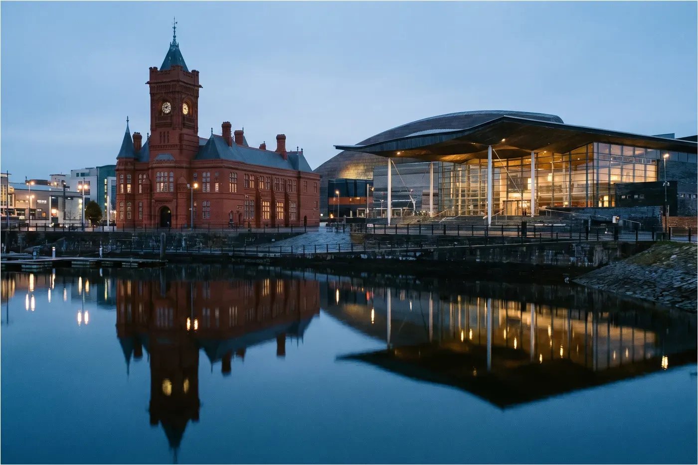 Cardiff Bay waterfront at dusk with the Pierhead Building